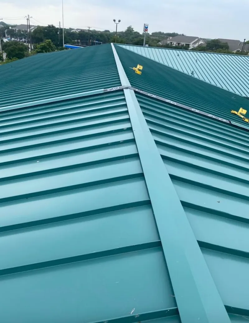 Green commercial metal roof ridge and valley for Metal Roof Repair in Blue Ash